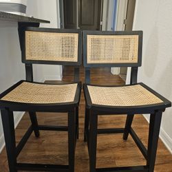 Black And Wicker Stools. 