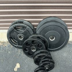 245lbs Olympic rubber coated/bumper weight set