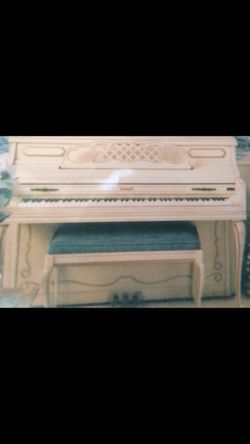 Kimball upright white piano