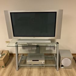 Entertainment Center With 42” Plasma Tv And Surround Sound Speakers