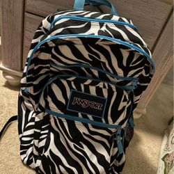 Jansport Blue and zebra double zipper backpack