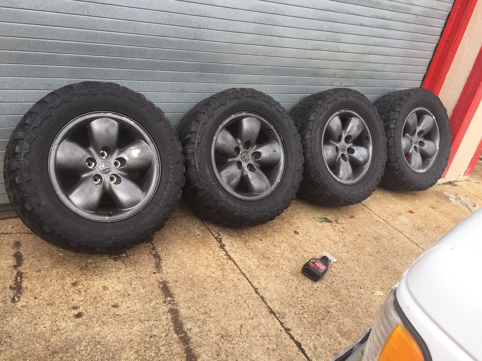 4- Dodge Ram 20 inch Rims with 35” inch tires, 2 have minimal tread on them and the other 2 have virtually no tread left on them. Priced to sell at 1