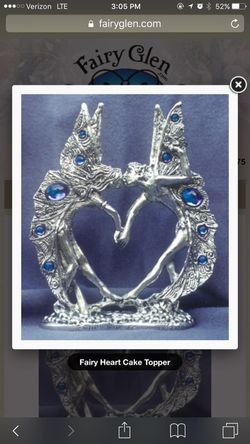 Fairy heart cake topper and wine glasses