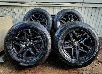 18” OEM Chevy Rims with tires