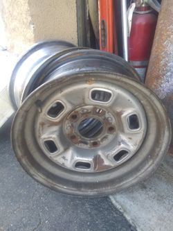 2 GM rims first one is 14x 7 second one is 14x6 15 dollars each