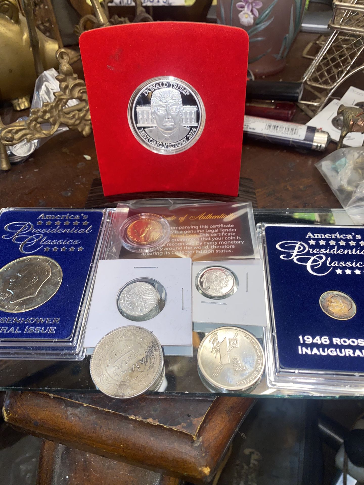 One silver gilded Donald Trump with CLA some other silver and plated gold nickel