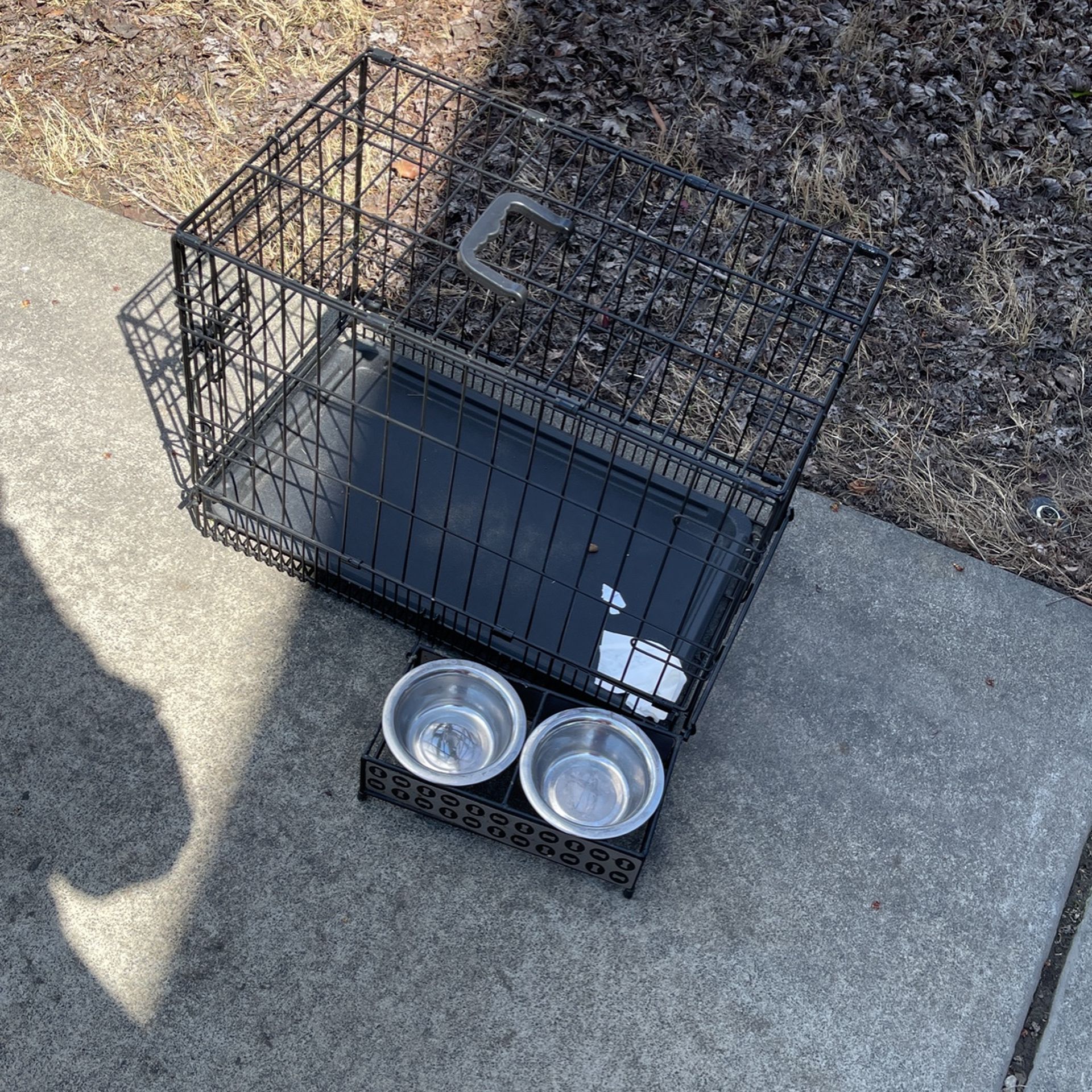 Dog Crate and Feeding Bowls