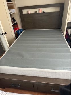Ashely Furniture Queen Bed frame brown