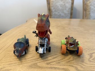 Dinosaur toy vehicles