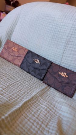 Coach card holders