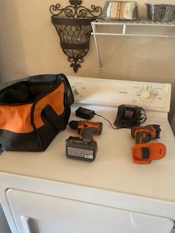 Brand new drill light charger and one battery