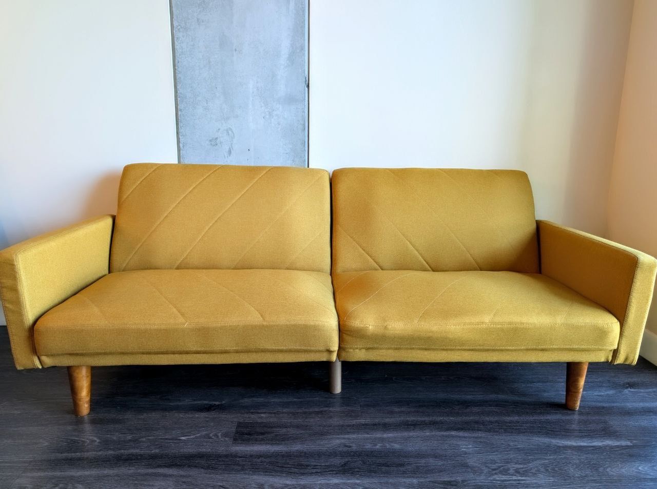Mid-century Sofa Futon fold out. Yellow/mustard fabric and walnut colored legs.