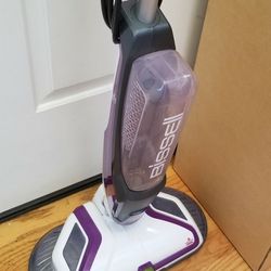 NEW cond BISSEL WASH FLOOR  CLEANIG , WORKS EXCELLENT  IN THE BOX 
