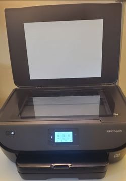 HP ENVY PHOTO 6255 includes the power cord, does not have ink cartridge.