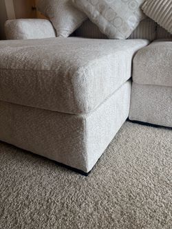 Beige sectional Ashley’s Furniture
