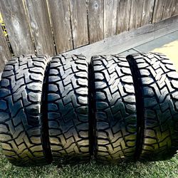 285/75r16 (33x11.5r16) Toyo Mud Tires/ AT 10 Ply Load E 70% Tread