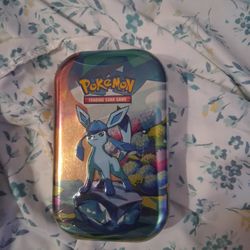 Prismatic Evolutions Tins