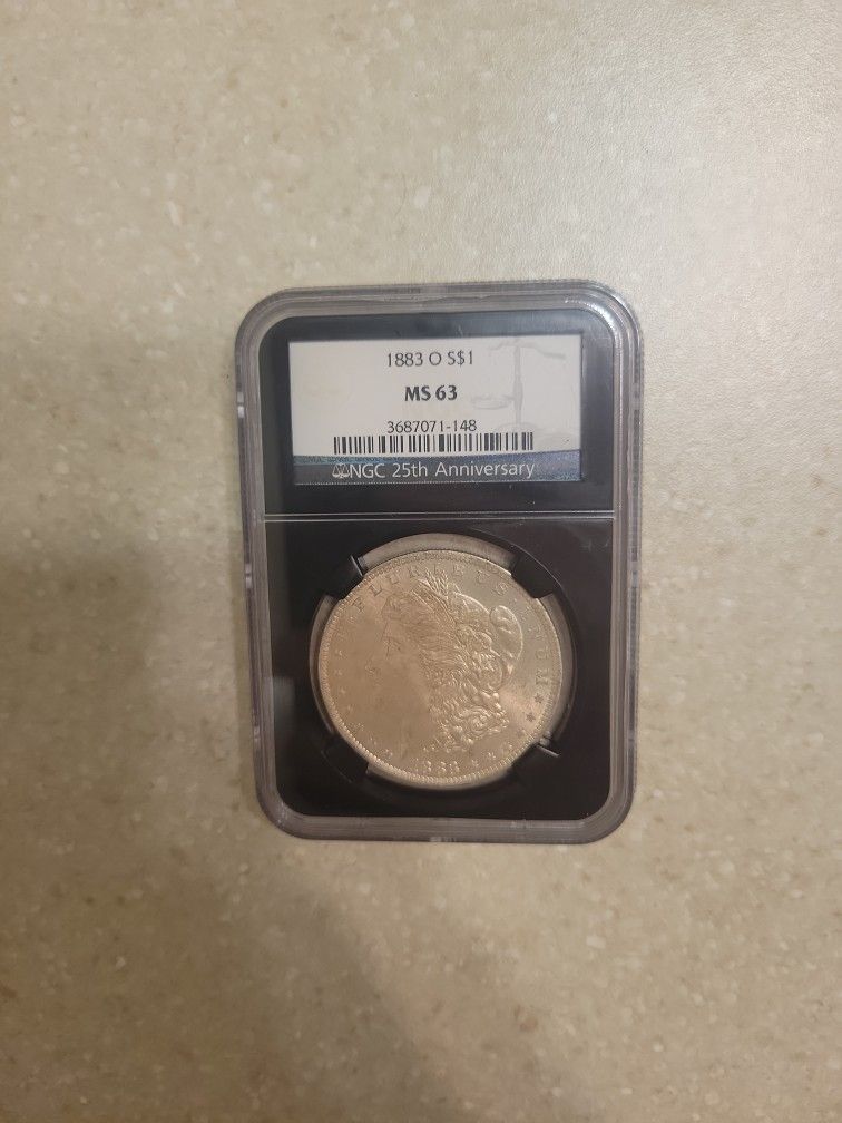 1883 O Morgan Silver Dollar. Graded