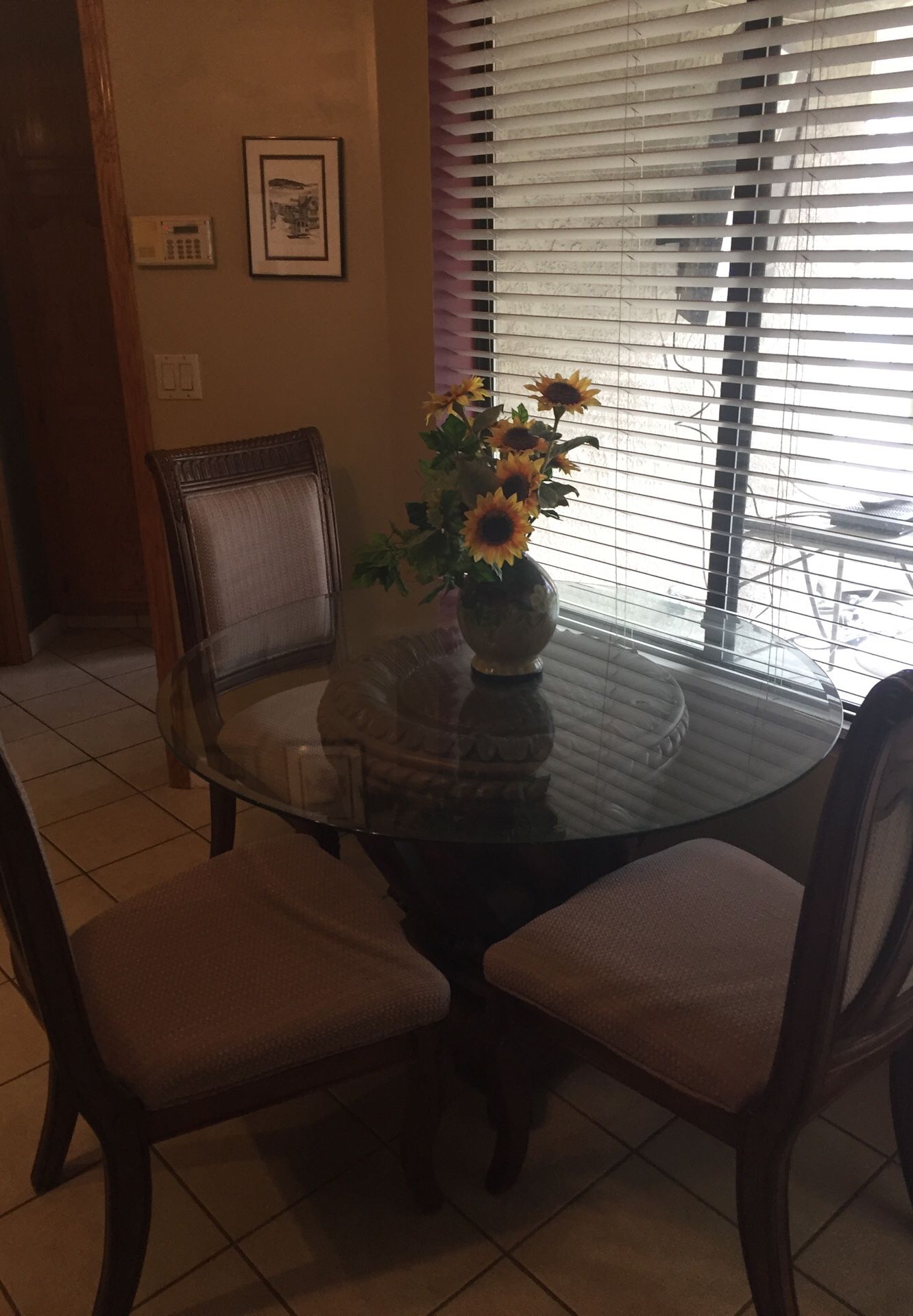 Beveled glass table four chairs