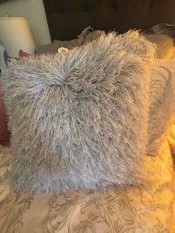 Large feathered throw pillow. Grey with silver threads