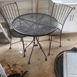 Metal Table With Two Metal Chairs 