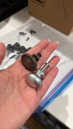 Oiled bronze and silver drawer knobs