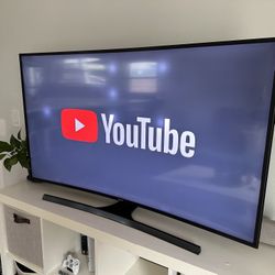 📺 Samsung – 55” Curved 4K UHD Smart TV