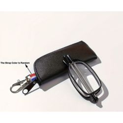Black folding reading glasses and a case