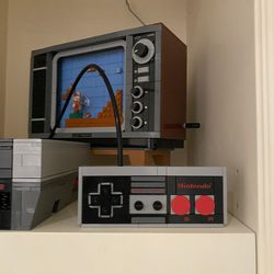 1980s-style TV set displaying the classic Super Mario Bros. Lego