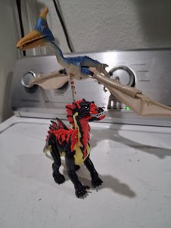 Vintage 1997 HASBRO  Jurassic Park Lost world  "Pteranodon Pterodactyl",  and  " Chaos effect Amarguspinos"  action figures.  .. Good condition.   ask