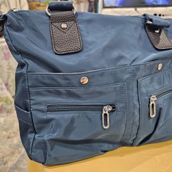 2 New totes, many pockets with cross shoulder strap