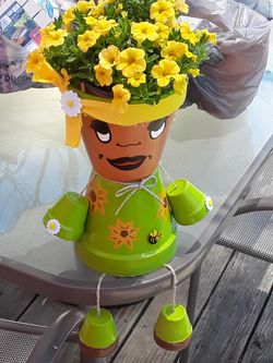 Clay flower pot people