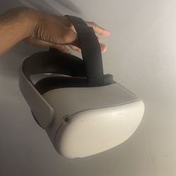Original Oculus quest 2 with elite strap and charging doc