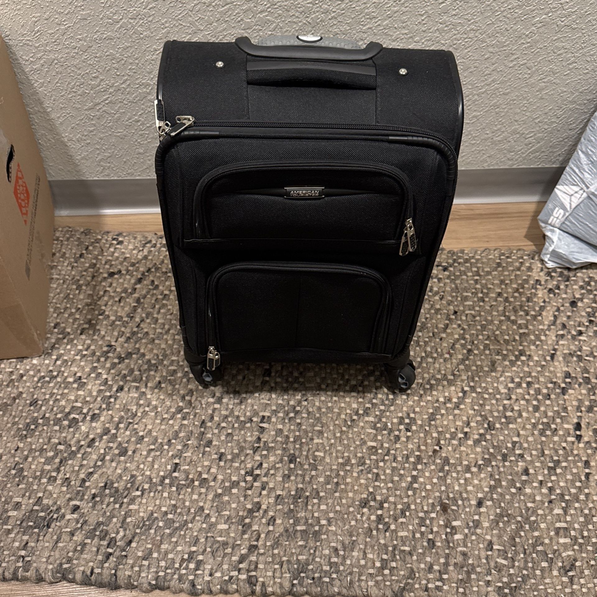 American Tourister carry-on travel bag