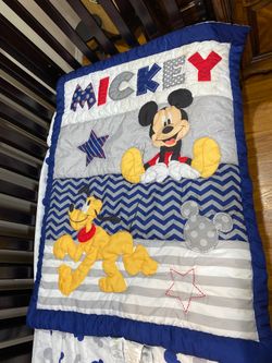 Crib comforter set includes comforter, sheet and sham.