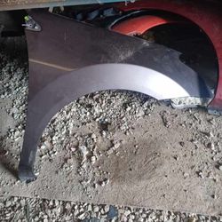 03 rogue right fender 