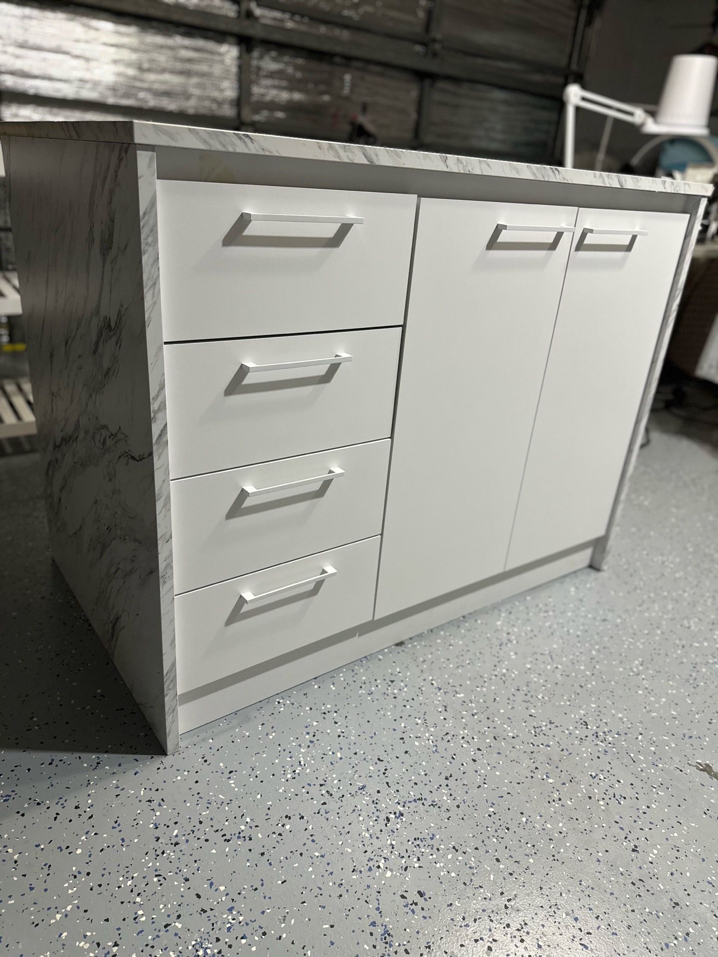 Kitchen island faux white marble with gray veins with peninsula
