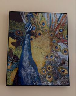 The  collage depicting a peacock