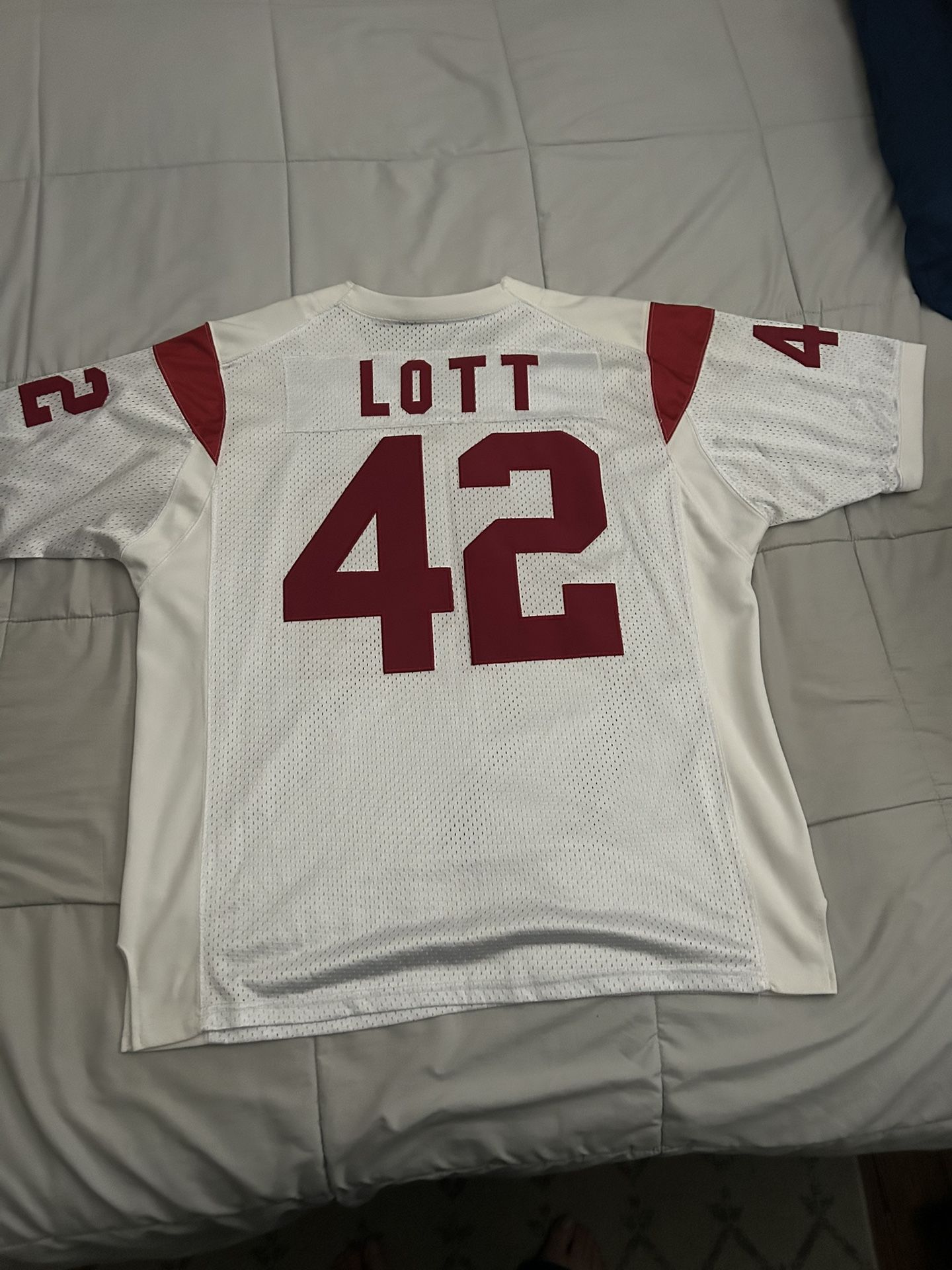 Size 48 :USC Trojans football jersey with the name "LOTT" and number "42",