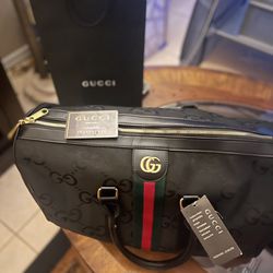 Gucci Duffle Bag/Leather Handles / With Bag