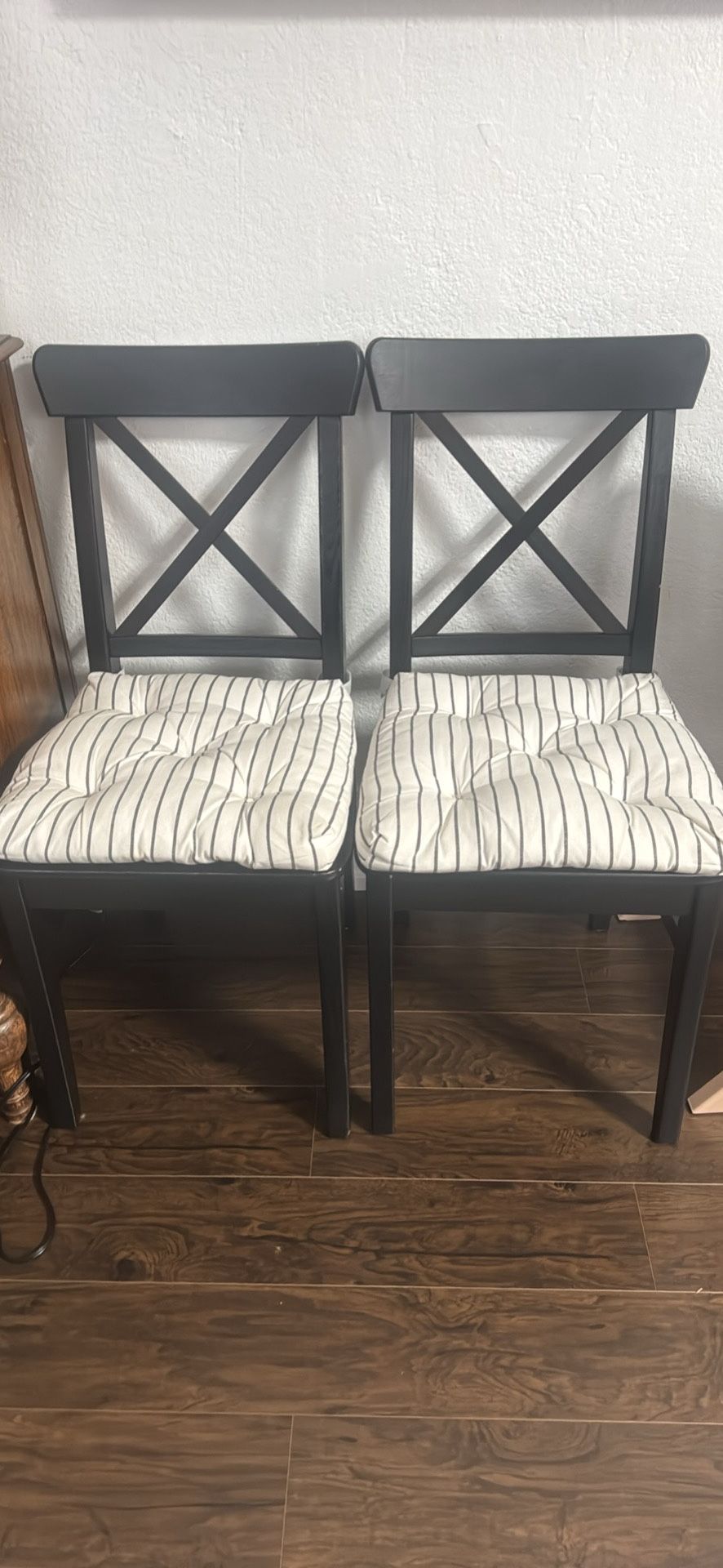 2 Black Wooden IKEA Chairs With Cushions