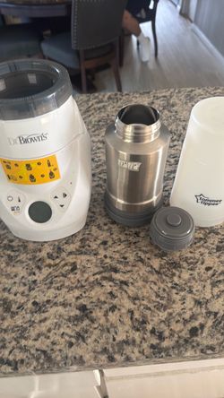 Dr bowns bottle heater and tommee tippee warm water holder
