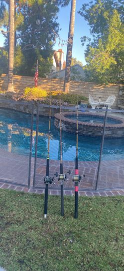 THREE Penn Saltwater Fishing Reels with Sabre & UGLY STICK Tiger Fishing rod.