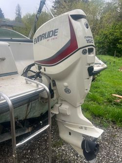 150hp Evinrude w 80hrs. Like new. Boat and trailer included