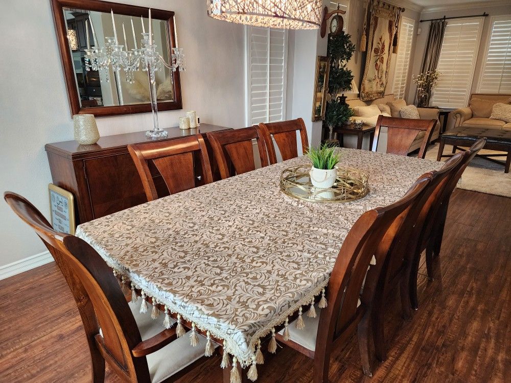 11 Piece Dining Set: Table, 8 Chairs, Buffet, and A Mirror