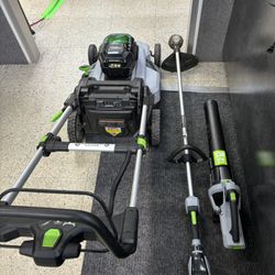 EGO Electric Mower, Trimmer And Leaf Blower Plus 2 56V Chargers