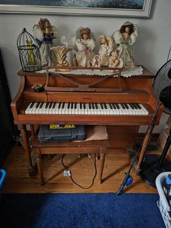 baldwin piano upright, brown wood, great condition with minor cosmetic issues