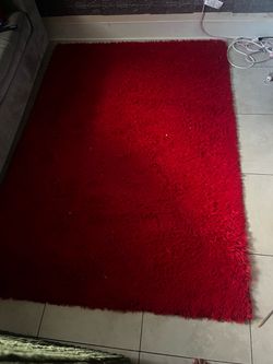 Red fluffy washable carpet