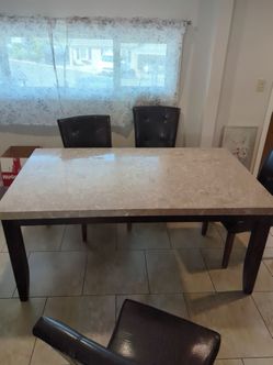 Marble table $200 obo chairs not included