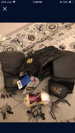 Wilson Gloves And Baseballs